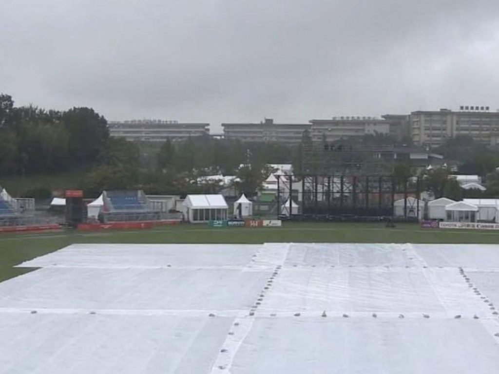 Covers placed over the cricket pitch at Korogi Sports Park in Nagoya after rain caused the Nepal vs Sri Lanka quarter-final washout
