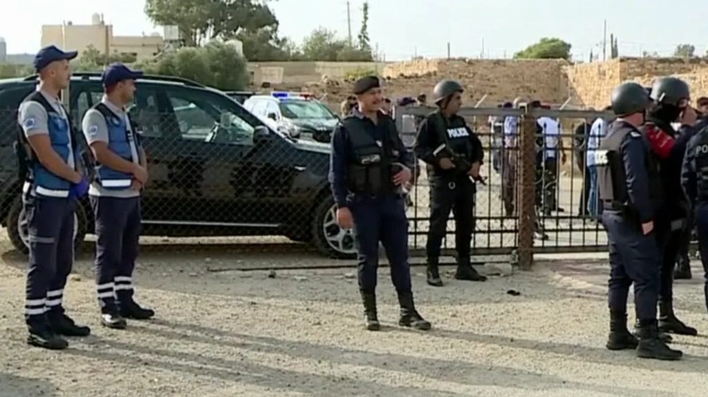 Jordanian security forces cordoning off the area surrounding a church in Karak following a shooting attack