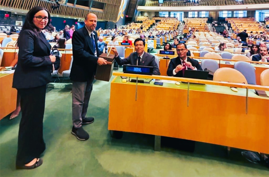 Nepal's Permanent Representative to the UN casting a ballot at the UN General Assembly hall in New York during the UNHRC elections