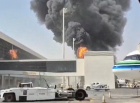 Damaged Saudia Airlines commercial aircraft parked at King Khalid International Airport terminal following missile shrapnel damage
