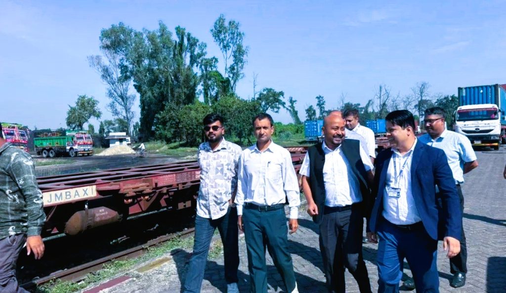 Government officials inspecting the railway tracks and container yard at Birgunj Dry Port in Nepal