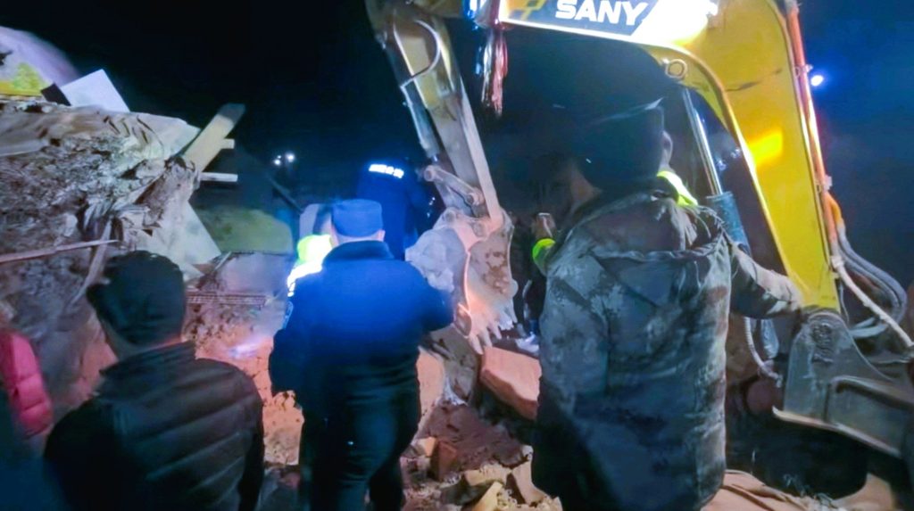 Rescuers searching through rubble and setting up relief tents in Nagqu, Tibet following the 7.0-magnitude earthquake