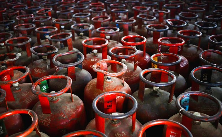 Cooking gas LPG cylinders lined up for distribution at a designated exchange center in Kathmandu