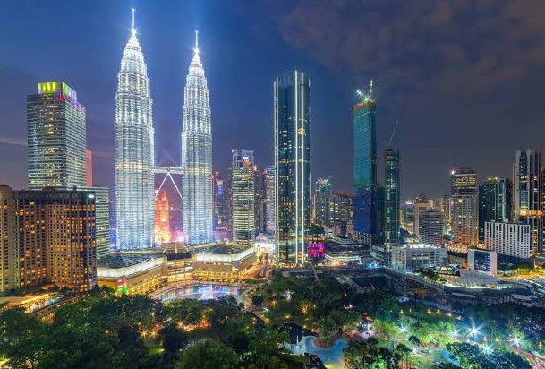 Kuala Lumpur skyline in Malaysia where foreign labor recruitment rules under FWCMS were finalized