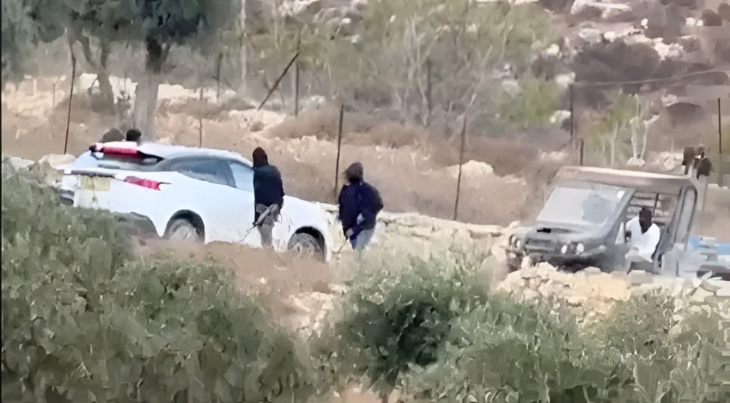Smashed diplomatic vehicle window and police presence near the West Bank village of Taybeh following a settler attack