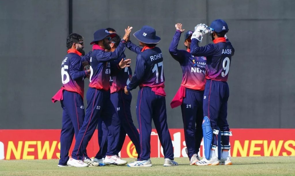 Nepali cricket team players celebrating after taking the final wicket to defeat Oman by 10 runs at Al Amerat Cricket Ground