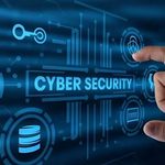 Cybersecurity operations center monitors glowing server status screens during emergency global patching efforts