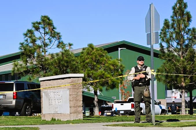 Police tape surrounding Silver Rail Elementary School in Bend, Oregon, during emergency investigation following a deadly shooting incident