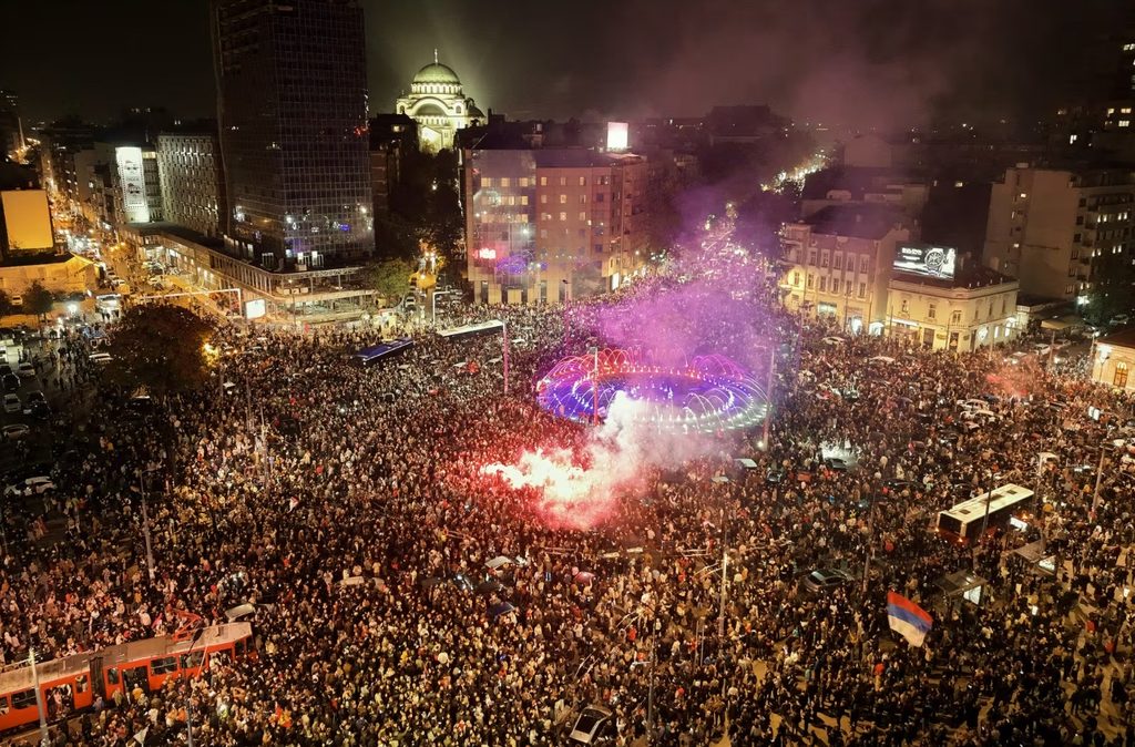 Supporters of the Student List celebrating outside the National Assembly in Belgrade after Aleksandar Vučić conceded defeat
