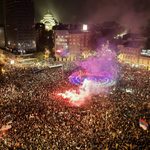Supporters of the Student List celebrating outside the National Assembly in Belgrade after Aleksandar Vučić conceded defeat