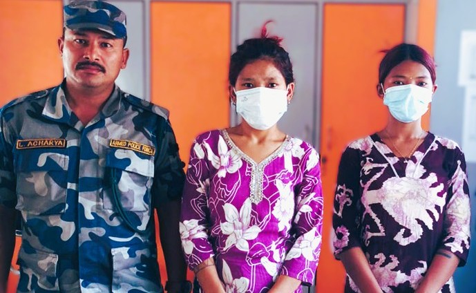 Armed Police Force personnel inspecting seized drug tablets and capsules at the entrance of Morang District Prison in Biratnagar